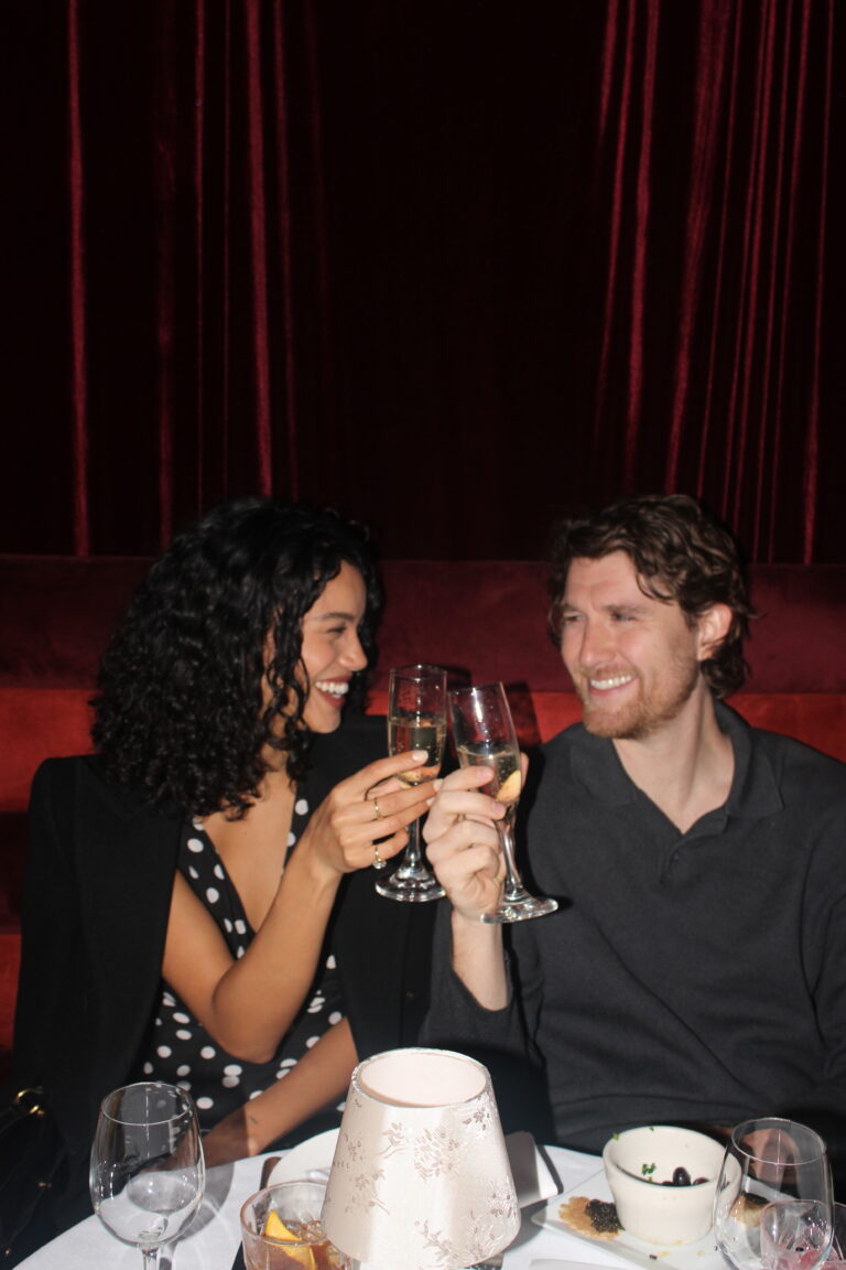 Couple celebrating at a romantic restaurants nyc with premium dining experience